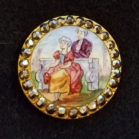 GORGEOUS ANTIQUE PAINTED ENAMEL W/A COUPLE SCENE AND A CUT STEEL BORDER  1-1/16" Cover