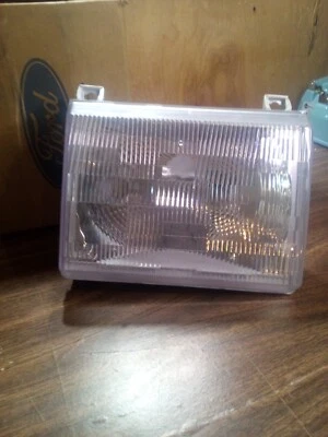 Farol Ford Bronco destro passageiro E7TZ-13007-A novo na caixa 1987-1991 - Imagem 1 de 4