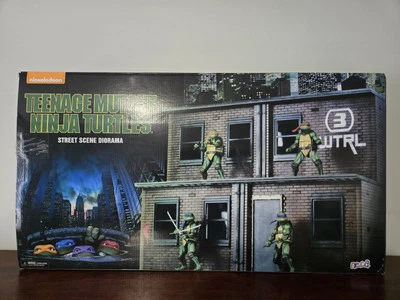 NECA Teenage Mutant Ninja Turtles SDCC escena callejera diorama película nueva Foto 1 de 3
