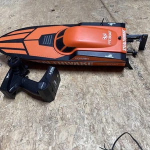 Pro Boat Stealthwake 23" RTR RC Boat (Horizon Hobby) + 2.4GHz Radio & Charger - Picture 1 of 3