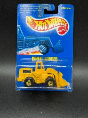 Hot Wheels CAT WHEEL LOADER - 1992 Yellow Workhorses construction T - Image 1 of 3