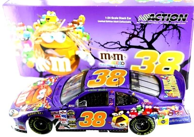 Elliott Sadler #38 M&M/Halloween 2005 Taurus.  1-24th scale NASCAR diecast. - Image 1 of 4