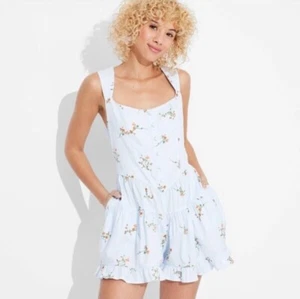 Nuevo con etiquetas Mameluco Retro Pinup Wild Fable Talla L Azul Bebé Estampado Floral Corto en Niveles - Imagen 1 de 6