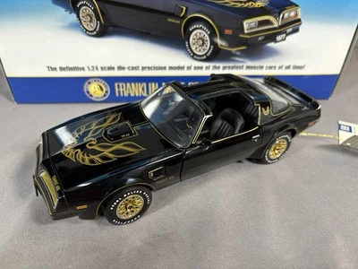 Franklin Mint 1977 Pontiac Firebird Trans Am Black Gold w/ T Tops & Papers 1/24 - Image 1 of 4