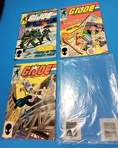 VINTAGE G.I.JOE MARVEL COMICS (ERÖFFNET) FABRIK 3ER-PACK - #2, #26, #27 NOS NEU!!! - Bild 1 von 2