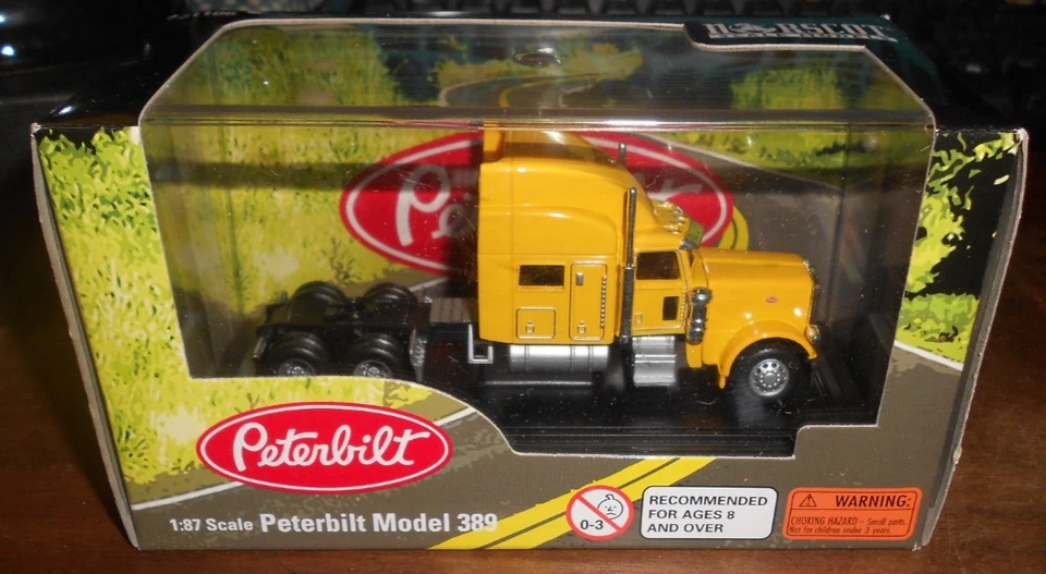 Camión miniatura de plástico Peterbilt 389 1:87 HO Logistics 4" nuevo en caja. Foto 1 de 3