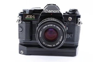 Canon AE-1 PROGRAM analoge Kleinbildkamera schwarz Gehäuse mit Power Winder NFD 50mm f/1.8 Set - Bild 1 von 12