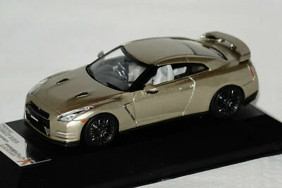 NISSAN GT-R 45TH ANNIVERSARY ORO 2015 PREMIUM X PRD516J 1/43 LHD IXO SILICA - Immagine 1 di 2