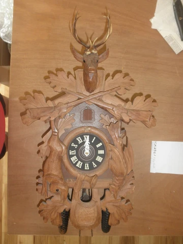 German made Schmeckenbecher. Linden Wood Hunter 8 Day Cuckoo Clock CK3261 Cover