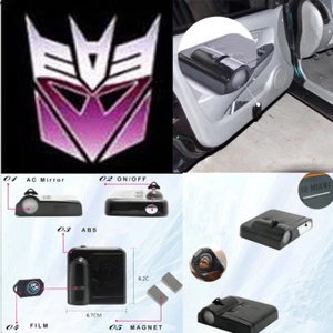 Car Door LED Shadow Light Decepticon Transformers Purple Wireless for TRAX DL445 - Foto 1 di 11