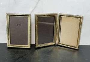 "Marcos de fotos de metal vintage pequeños tono dorado MCM con bisagras 3"" X 2""" - Imagen 1 de 9