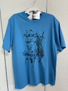 precio de ganga CAMISETA UNIQLO METAL GEAR ARCHIVO SÓLIDO GRÁFICO UT en mano azul - Imagen 1 de 10