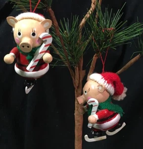 Vintage Christmas Ornaments 2 Wooden Santa Pigs Ice Skating - Picture 1 of 8
