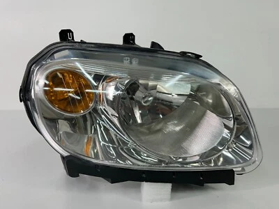 ¡COMO NUEVO! Faro halógeno del lado derecho del pasajero Chevrolet HHR 2006-2011 FABRICANTE DE EQUIPOS ORIGINALES Foto 1 de 4