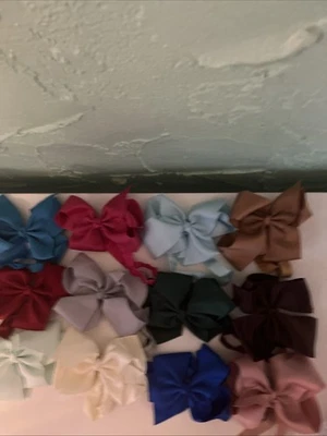 12 Nylon Headbands With 6 Inch Bows In Multicolored For Babies And Toddlers - Image 1 of 4