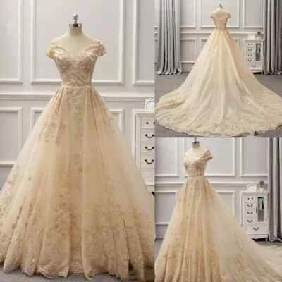 Vestidos de novia champán una línea fuera del hombro con núcleo de tren vestidos de novia Foto 1 de 4