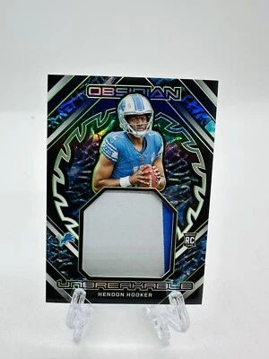 2023 Panini Obsidian Hendon Hooker Unbreakable Patch /25 #UMHHO - Image 1 of 2