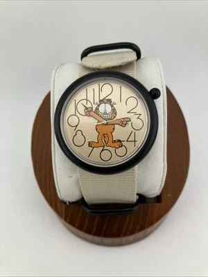 Reloj Armitron 1978 de colección para hombre 41 mm caja negra esfera Garfield correa de nailon tostado - funciona Foto 1 de 4