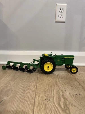 1/16 Scale John Deere 3020 Tractor W 4 bottom Plow Left side duals Farm Toy Read - Image 1 of 4