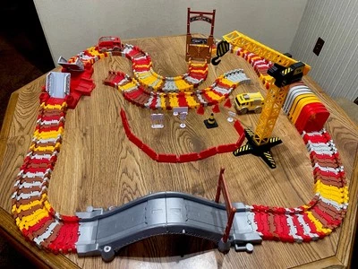 Flexible MAGIC TRACK: Ramp, Bridge, Crane, 2 Light Up Trucks, Accessories LOT - Image 1 of 4