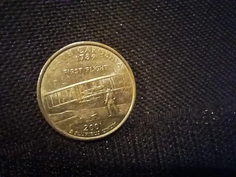 RARE 2001 State Quarter North Carolina ERROR. Missing NOR From Back Of Coin Cover