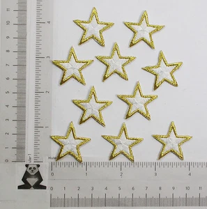 Apliques de parche de hierro - 10 estrellas blancas borde dorado 1 3/16" 30,1 mm - Imagen 1 de 1
