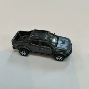 Matchbox '16 Chevy Colorado Xtreme 67/100 gris plata 1:64 - Imagen 1 de 2
