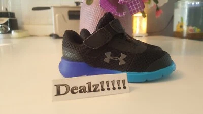 \UNDER ARMOUR ~ Zapatos Surge 2 AC para niños pequeños [3020486-005] Negro/Azul - Talla 5K Foto 1 de 4