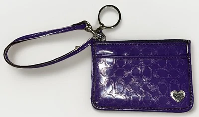 Cartera Coach Estuche de Identificación Llavero Correa de Muñeca Púrpura Patente Logo Corazón Foto 1 de 4