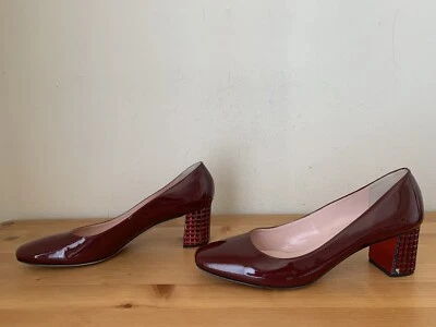 $350 Kate Spade "Danika" Women sz 8.5M Plum red patent Jeweled heel pumps - Image 1 of 4