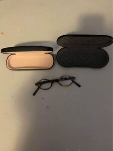 One Pair of prescription glasses and two cases preowned￼￼