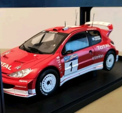签名 1/18 标致 206 WRC 拉力赛阿根廷 Marcus Gronholm 和 Timo Rautiainen — 第 1/4 张图片