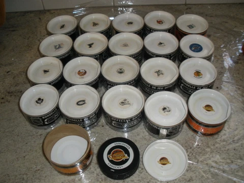 NHL OFFICIAL GAME PUCK IN TUBE/CARON (YOU CHOOSE) Cover