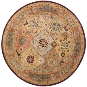 Safavieh Legend 3'6" Round Hand Tufted Wool Rug - Picture 1 of 10