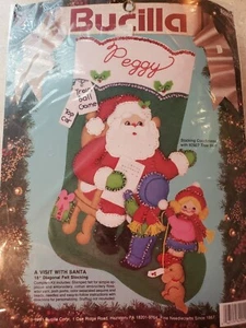 Kit calze in feltro Bucilla vintage 18" 82902 una visita con Babbo Natale 1991 - Foto 1 di 3