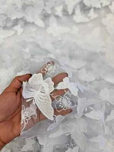 A new title in English for the listed item could be: "White 3D Butterfly Lace F - Picture 1 of 10