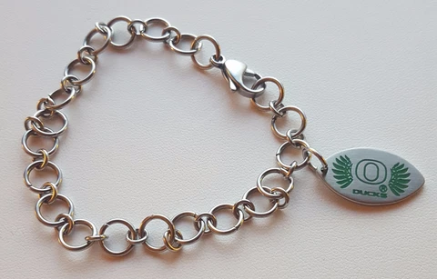 UNIVERSITY OREGON DUCKS * Stainless Steel Logo Charm Bracelet NCAA Jewelry Wings Cover