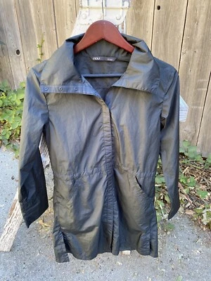 Chaqueta de lluvia para mujer Nau abrigo broches de presión repelente al agua talla XS larga trinchera cordón Foto 1 de 4