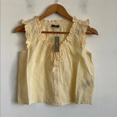 J. Blusa de algodón amarillo claro XXS con volantes y botones Foto 1 de 4