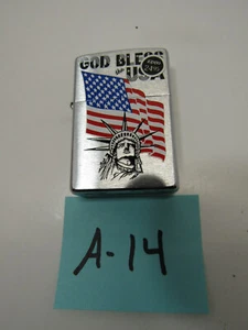 A-14 NIB OLD ZIPPO LIGHTER AMERICAN FLAG GOD BLESS USA STATUE LIBERTY COLLECT - Picture 1 of 2