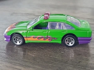 Vehículo de emergencia Hot Wheels Flames 1989 verde/púrpura/naranja - hecho en Malasia - Imagen 1 de 7
