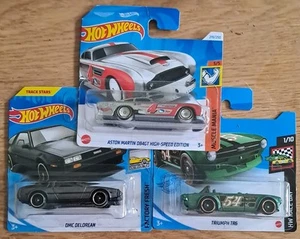 Hot Wheels X 3 British car models. Triumph TR6, DMC Delorean, Aston Martin. bnib - Picture 1 of 4