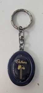 Cadbury lila drehender Schlüsselanhänger Keyfob Benutzer - Bild 1 von 2