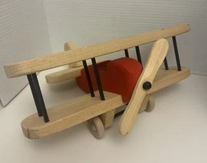 HOLZSPIELZEUG ZWEIFLUGZEUG handgefertigt funktionierender Propeller und Räder rot schwarz Kiefer gebraucht - Bild 1 von 14