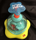 Bright Starts Musical Baby Toy Press & Glow Spinner Cause & Effect Age 6M+ 10042