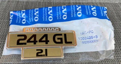 NOS VOLVO 1979-82 244 GL 2.1 GUARD BADGE IN ORIGINAL PACKAGING!! P.N.1202425-3 - image 1 of 4
