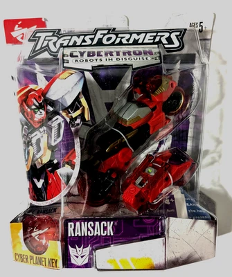 Figura de acción Hasbro Transformers Cybertron Ransack Scout Class con Cyber Key Foto 1 de 4