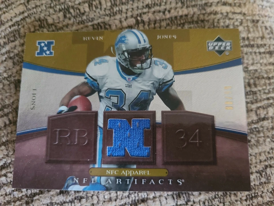 Kevin Jones 2007 Upperdeck Artifacts NFC Apparel Gold Football Card /99 NFC-KJ - Image 1 of 3