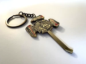 Aged Brass Tone Firefighter Serve and Protect Axe Badge Medallion Keychain - Picture 1 of 12