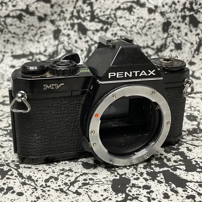 Cámara fotográfica Asahi Pentax MV 35 mm funciona pero le falta perilla de rebobinado y necesita reparación Foto 1 de 4